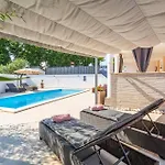 Melani By